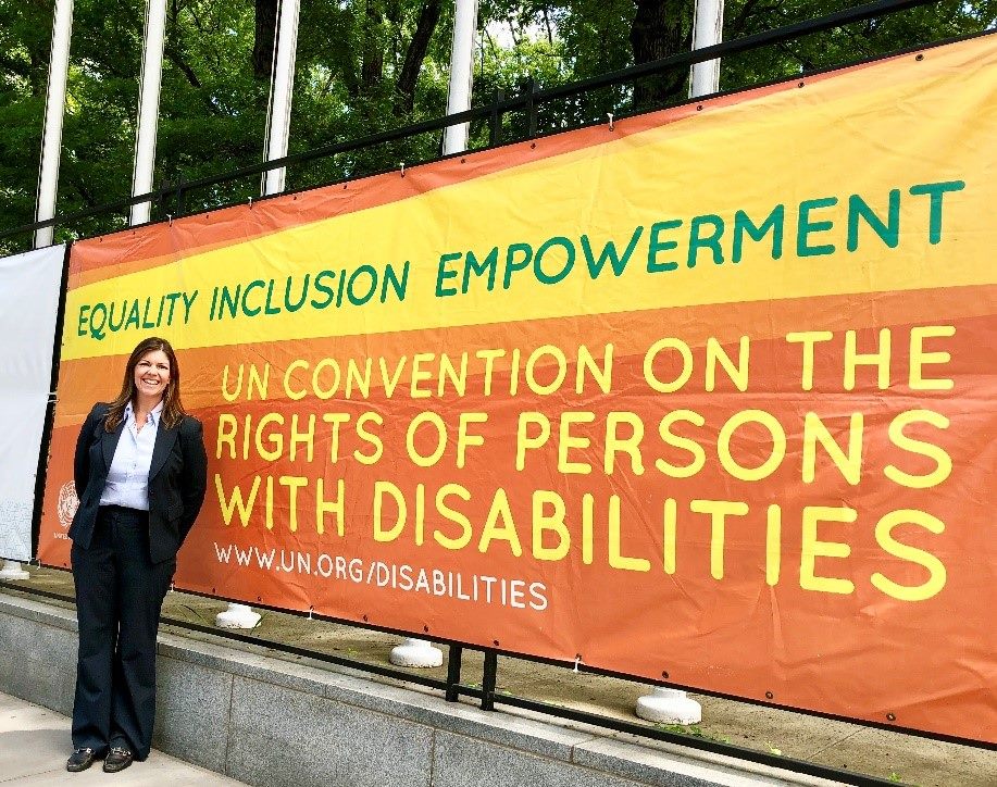 Jane Cunningham in front of the UN COPD banner in 2018
