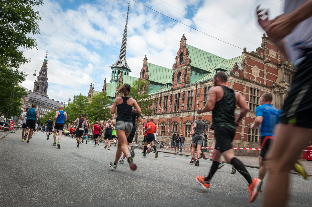 Picture form CPH Half Marathon taken in the front of the old stock exchange building and the Danish Parliament, Christianborg Castle.