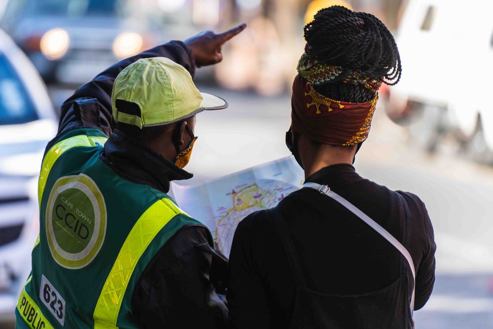 Cape Town CCID giving directions to a woman